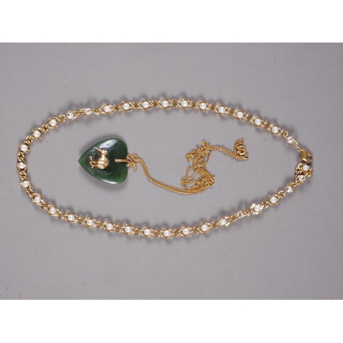 250 - A 9ct gold chain with nephrite heart-shaped pendant, set with yellow metal model of a kiwi, and anot... 