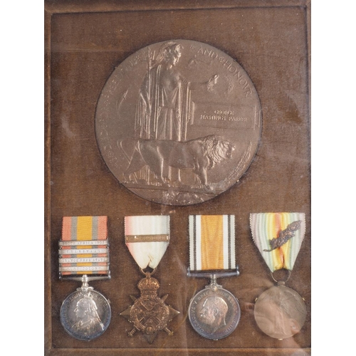 266 - A set of medals awarded to Maj George Hastings Parker, Hampshire Regiment, together with memorial pl... 