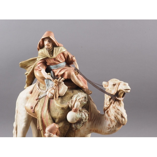 3 - A Royal Crown Dux model of a camel and rider, 17 1/2