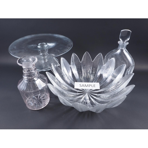 39 - A clear glass Orrefors decanter and stopper, an opaline glass table lamp, 9 1/2