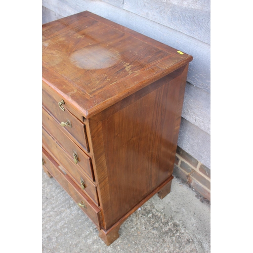 481 - A bachelor's figured walnut and banded chest of four drawers, on bracket feet, 24