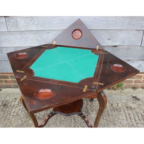 485 - An Edwardian rosewood, marquetry and line inlaid two-tier envelope card table with drawer, on cabrio... 