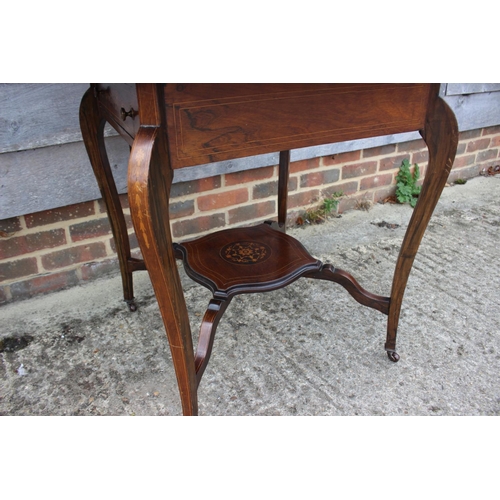 485 - An Edwardian rosewood, marquetry and line inlaid two-tier envelope card table with drawer, on cabrio... 