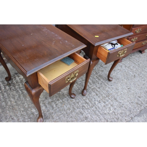 494 - A pair of mahogany lamp tables, fitted one drawer, on cabriole supports, 24