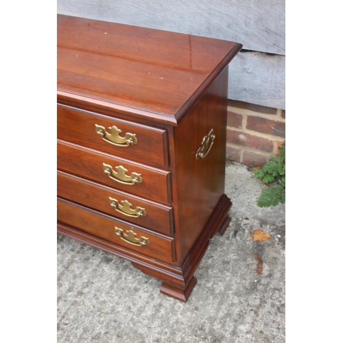 499 - A Brights of Nettlebed mahogany chest of four drawers, on bracket feet, 17