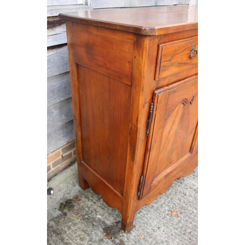 577 - A French walnut side cabinet, fitted two long and one short drawer over two cupboards, on cabriole s... 