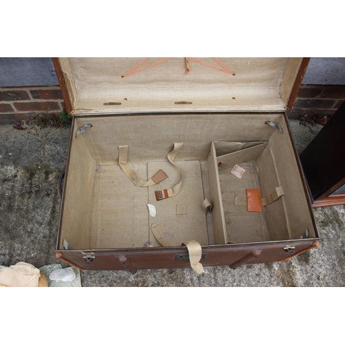 626 - A late 19th century canvas and maple bound travel trunk with fitted interior and lift-out tray