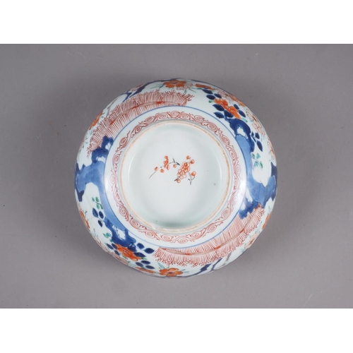 67 - Two Chinese Imari pattern bowls (damages) and a pair of Japanese figures, 8