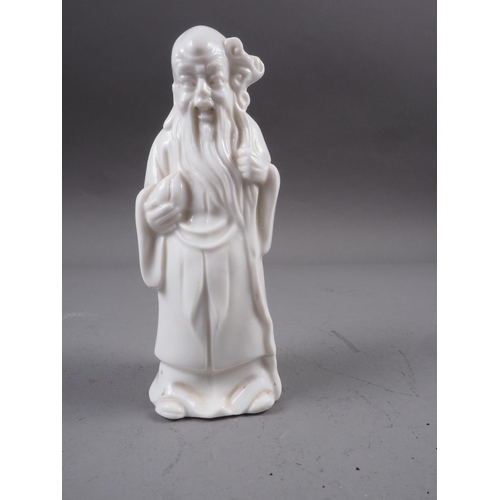 68 - A Chinese blanc de chine figure of an immortal, 5 3/4