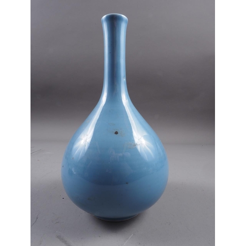 69 - A Chinese blue monochrome sprinkler vase, 10 1/4