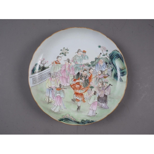 70 - A Chinese famille rose shaped edge dish, decorated figures and reverse decorated bats with seal mark... 