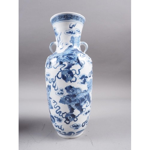 72 - A Chinese blue and white baluster two-handled vase, decorated mythical beasts and clouds with four-c... 