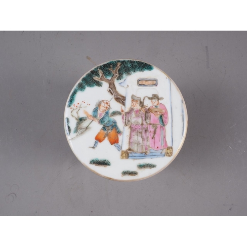 74 - A Chinese famille rose cylindrical box and cover, decorated figures in a landscape with seal mark to... 