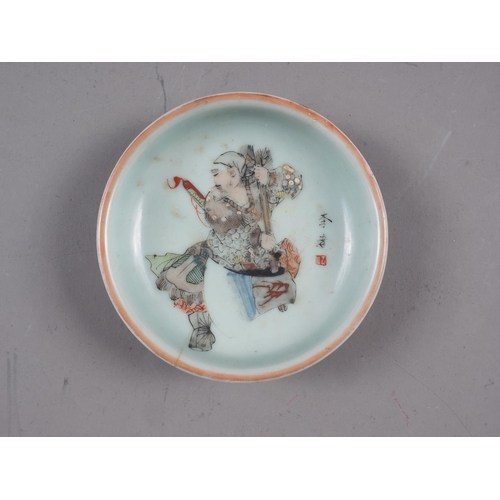 75 - A Chinese celadon glazed dish, decorated figure and verse, 4