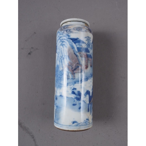 77 - A Chinese blue, white and iron oxide cylindrical vase, decorated animals in a landscape, 3 1/2