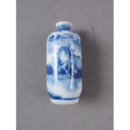 77 - A Chinese blue, white and iron oxide cylindrical vase, decorated animals in a landscape, 3 1/2