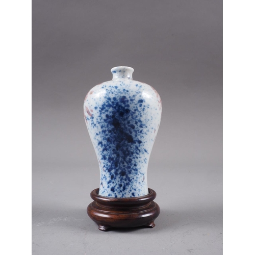 79 - A Chinese meiping vase, decorated blue and iron oxide sprays, 3 1/4