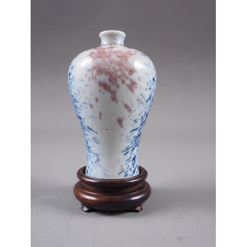 79 - A Chinese meiping vase, decorated blue and iron oxide sprays, 3 1/4