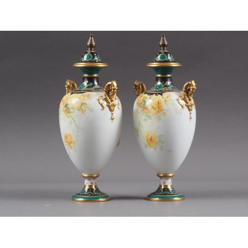 8 - A pair of Royal Crown Derby baluster pedestal two-handled vases and covers with floral decoration an... 