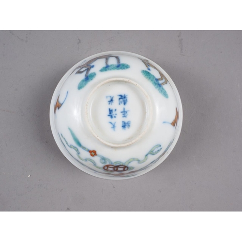 80 - A Chinese famille verte bowl, decorated beasts and bats, with six-character mark to base, 3 1/2