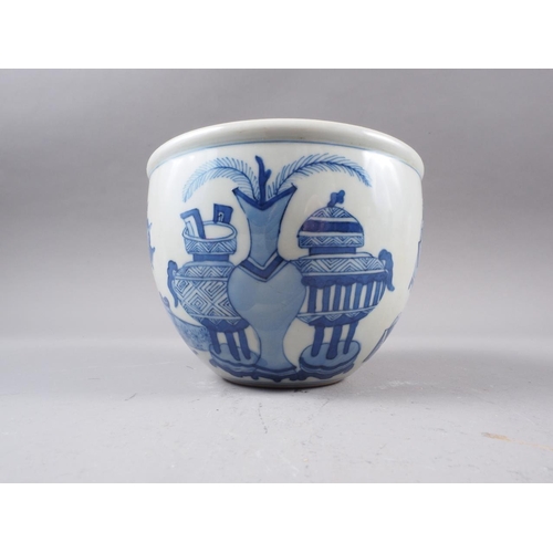 83 - A Chinese blue and white jardiniere, decorated precious objects, 4