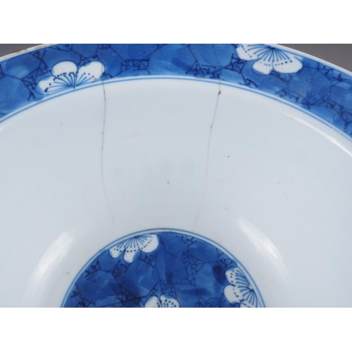 86 - A Chinese blue and white bowl with floral decoration and six-character mark to base, 8