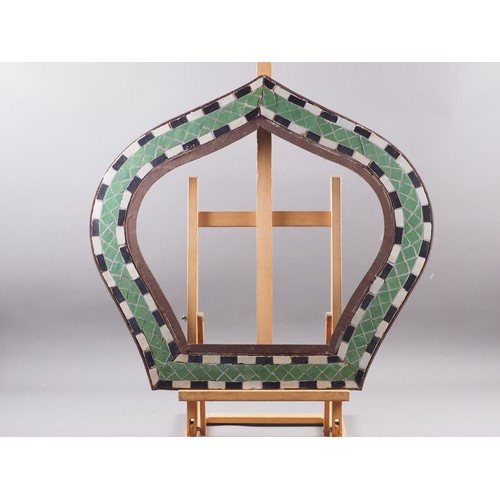 185 - A wrought iron and mosaic design frame, 25