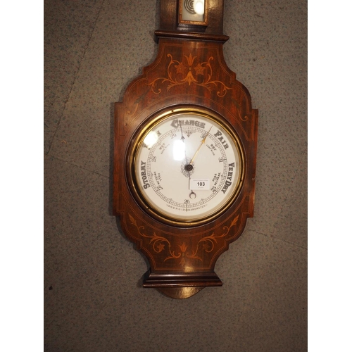 103 - An Edwardian mahogany and inlaid aneroid barometer and thermometer