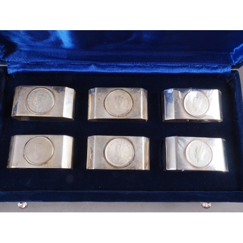 219 - A selection of silver plated flatware and a cased set of six plated napkin rings