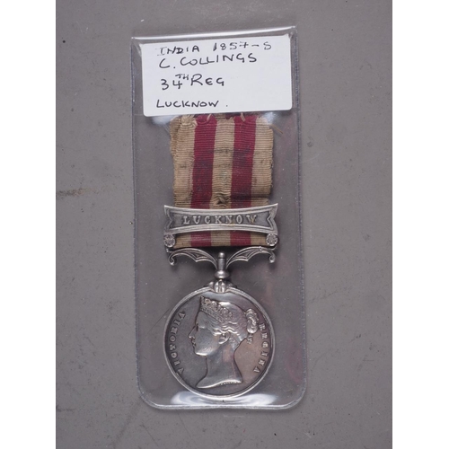 260 - An Indian Mutiny 1857-8 medal with Lucknow bar, awarded to C Collings, 34th Regt Foot