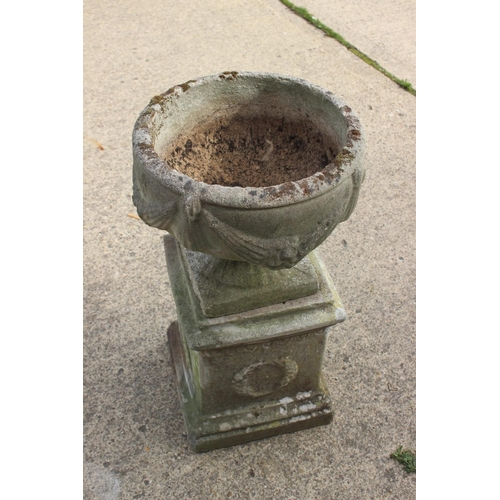 622 - An antique cast stone planter with swag decoration, on square base, 29