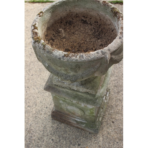 622 - An antique cast stone planter with swag decoration, on square base, 29