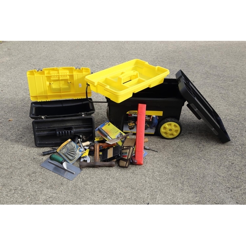 624 - Two Stanley plastic tool chests and a quantity of hand tools