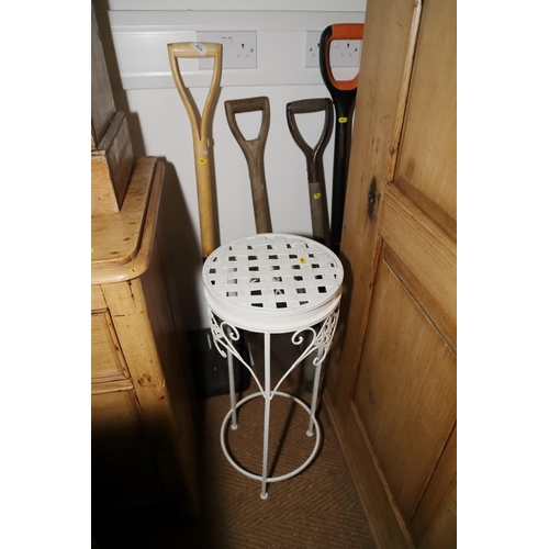 625 - A quantity of watering cans, a large number of nails and a square top table