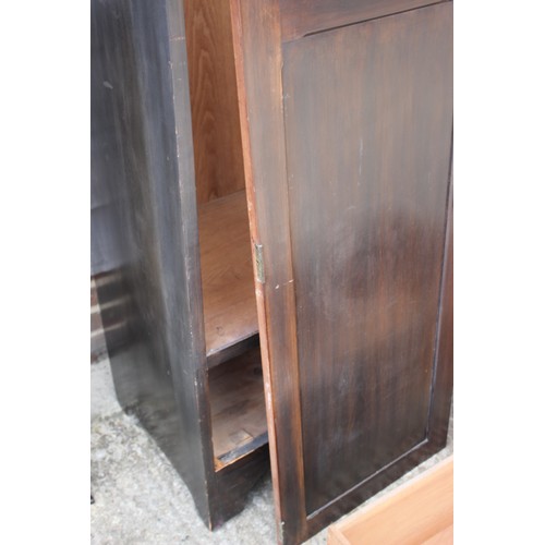 475 - An early 20th century walnut wardrobe enclosed leaded glazed door and mirror panel drawer over one d... 