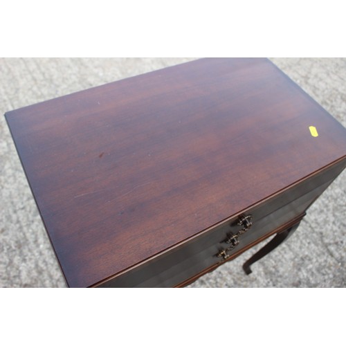 269 - A Community silver plate part table canteen, in mahogany three drawer, on cabriole supports