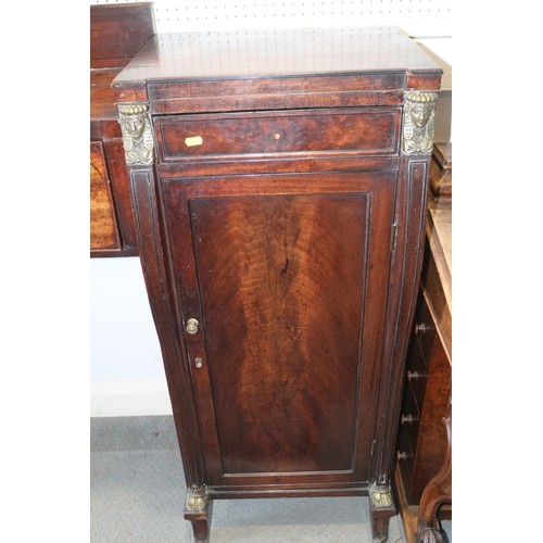 391 - A Regency mahogany and brass mounted drop centre double pedestal sideboard, fitted three drawers and... 