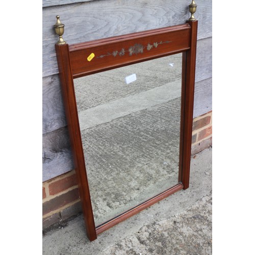 447 - A deep gilt swept frame wall mirror with bevelled edged plate, 18