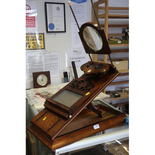 196 - A Rowsell's Patent Victorian carved walnut graphoscope viewer with slides