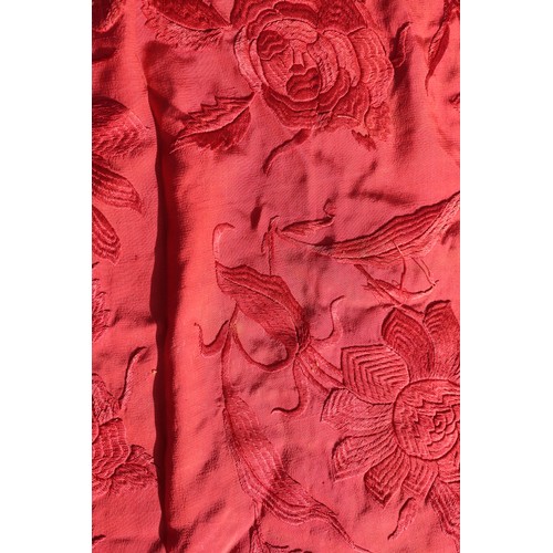 170 - An early 20th century red silk shawl with embroidery and tassel decoration, 64