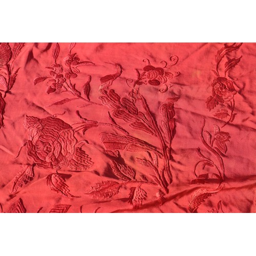 170 - An early 20th century red silk shawl with embroidery and tassel decoration, 64