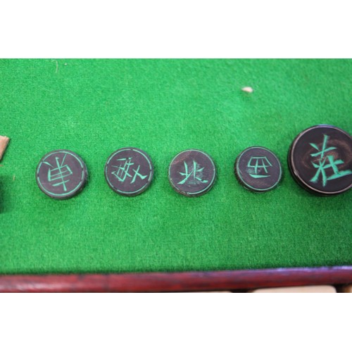 164 - A bone Mah-jongg set, in hardwood and brass mounted box, and a set of Mah-jongg wings