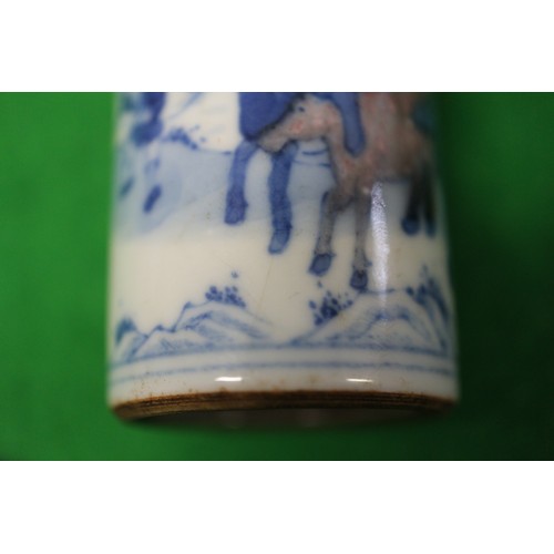 77 - A Chinese blue, white and iron oxide cylindrical vase, decorated animals in a landscape, 3 1/2