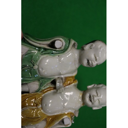 73 - A Chinese figure group, 5 3/4