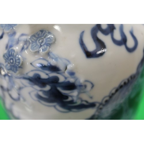 72 - A Chinese blue and white baluster two-handled vase, decorated mythical beasts and clouds with four-c... 