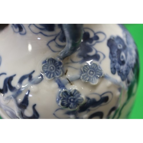 72 - A Chinese blue and white baluster two-handled vase, decorated mythical beasts and clouds with four-c... 