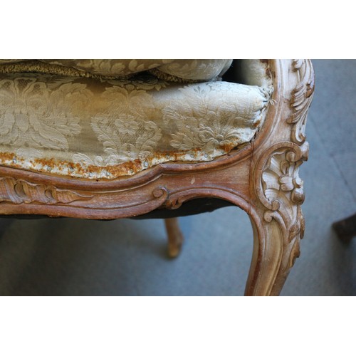 390 - A Louis XVI design carved walnut showframe armchair, on cabriole supports