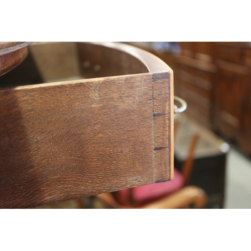 385 - An 18th century mahogany and satinwood banded oval Pembroke table, on square taper castored supports... 