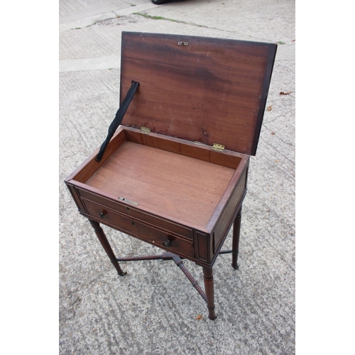 444 - A 19th century mahogany sewing table, fitted two drawers, on slender turned and castored supports, 3... 