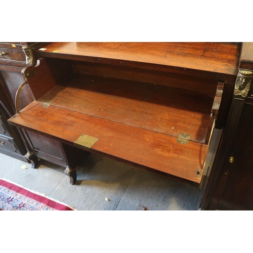 447 - A Regency mahogany and brass mounted drop centre double pedestal sideboard, fitted three drawers and... 